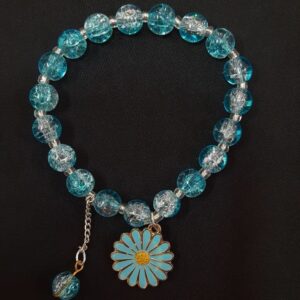 blue bead bracelet with daisy charm